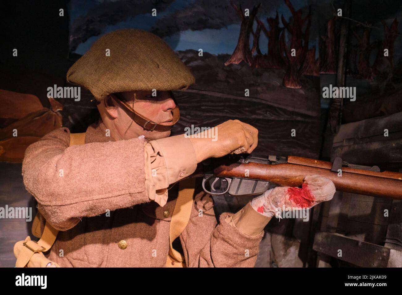 Recreation, diorama of a Great War, WWI injured soldier firing a rifle. In the Museum of 1st The Queen’s Dragoon Guards and The Royal Welsh at Cardiff Stock Photo