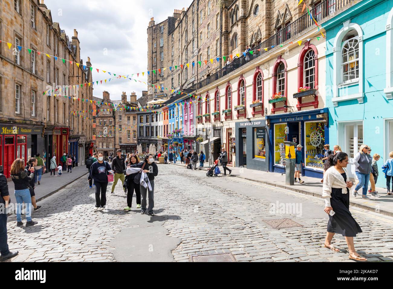 Victoria Street Edinburgh old town city centre, cobbled streets and colourful shopfronts, sunny summers day in July 2022,Scotland,UK Stock Photo