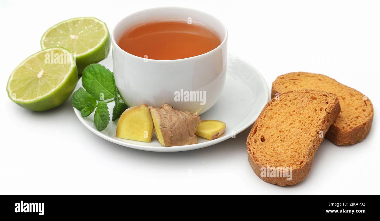 Herbal tea with different herbs and ingredient and toast as breakfast Stock Photo