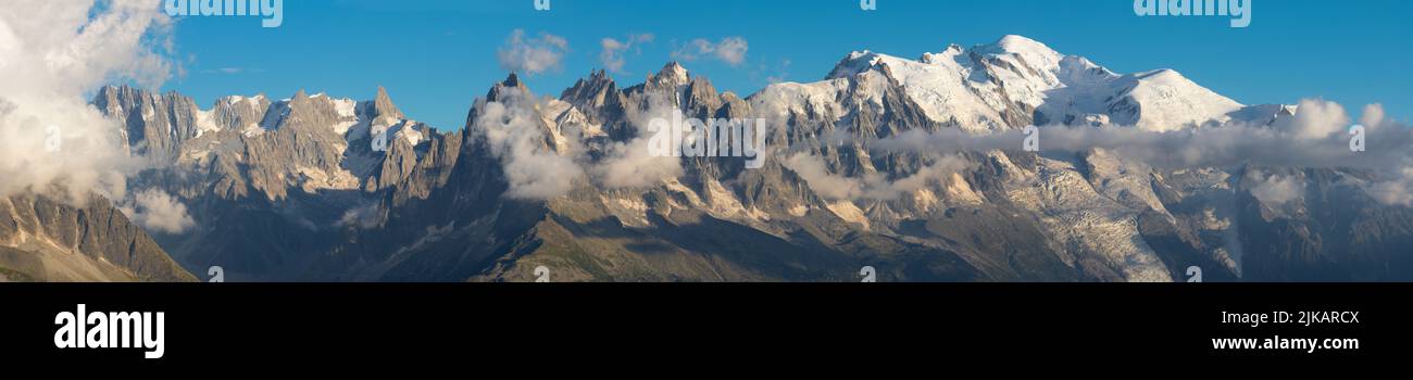 The panorama of Mont Blanc massif  Les Aiguilles towers and Grand Jorasses. Stock Photo