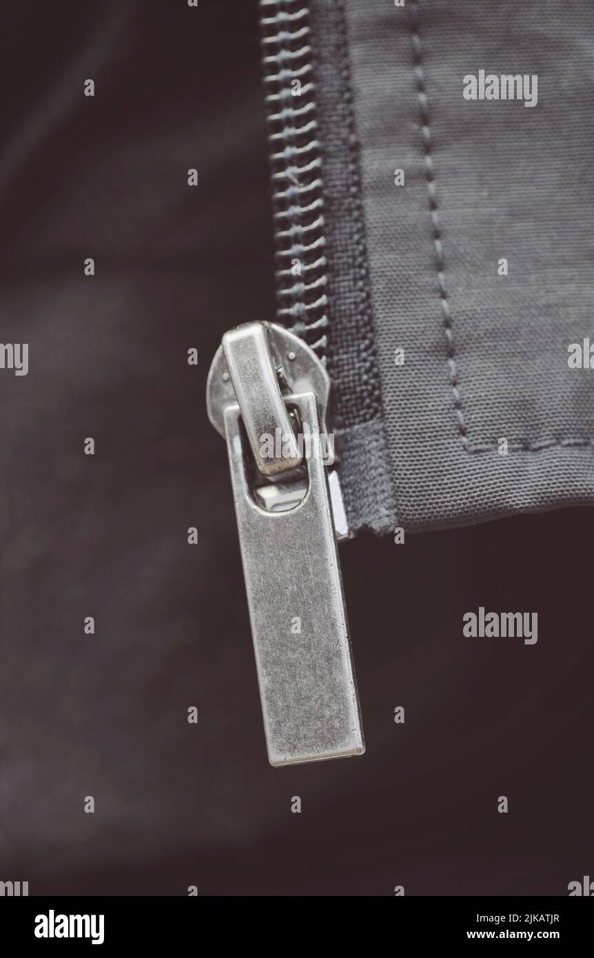 zipper pull tab of a jacket Stock Photo