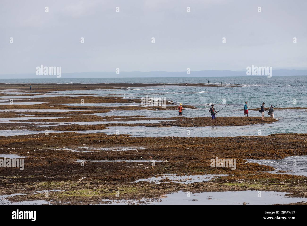 Serang, Indonesia. 01st May, 2022. People seen fishing around the Anak Krakatau Volcano on Cidatu Beach, Carita, Pandeglang, Banten. The status of the Anak Krakatau Volcano (Child of Krakatoa) is at Level III or standby. Fishermen and tourists are prohibited from doing activities within a 5 kilometer radius. Credit: SOPA Images Limited/Alamy Live News Stock Photo