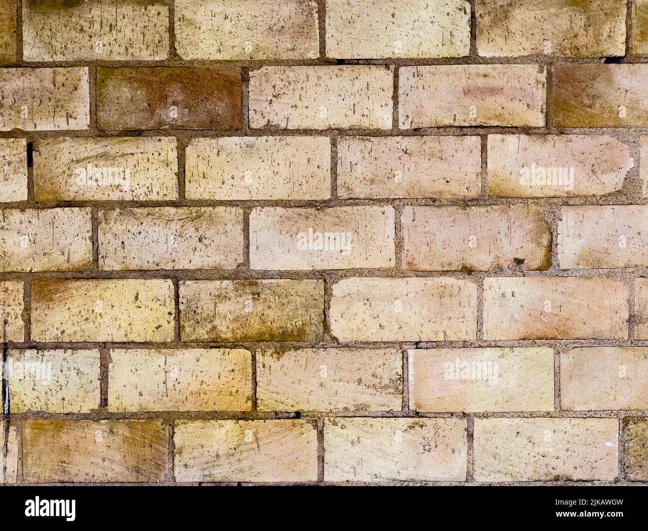 Brown beige brick wall grunge textured backdrop background  - stock photo Stock Photo