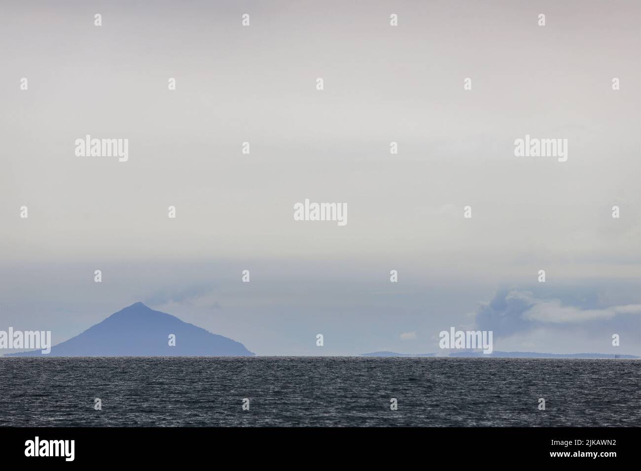 Serang, Indonesia. 1st May, 2022. General view of the Anak Krakatau Volcano activity seen from Pasauran, Serang, Banten. The status of the Anak Krakatau Volcano (Child of Krakatoa) is at Level III or standby. Fishermen and tourists are prohibited from doing activities within a 5 kilometer radius. (Credit Image: © Angga Budhiyanto/SOPA Images via ZUMA Press Wire) Stock Photo