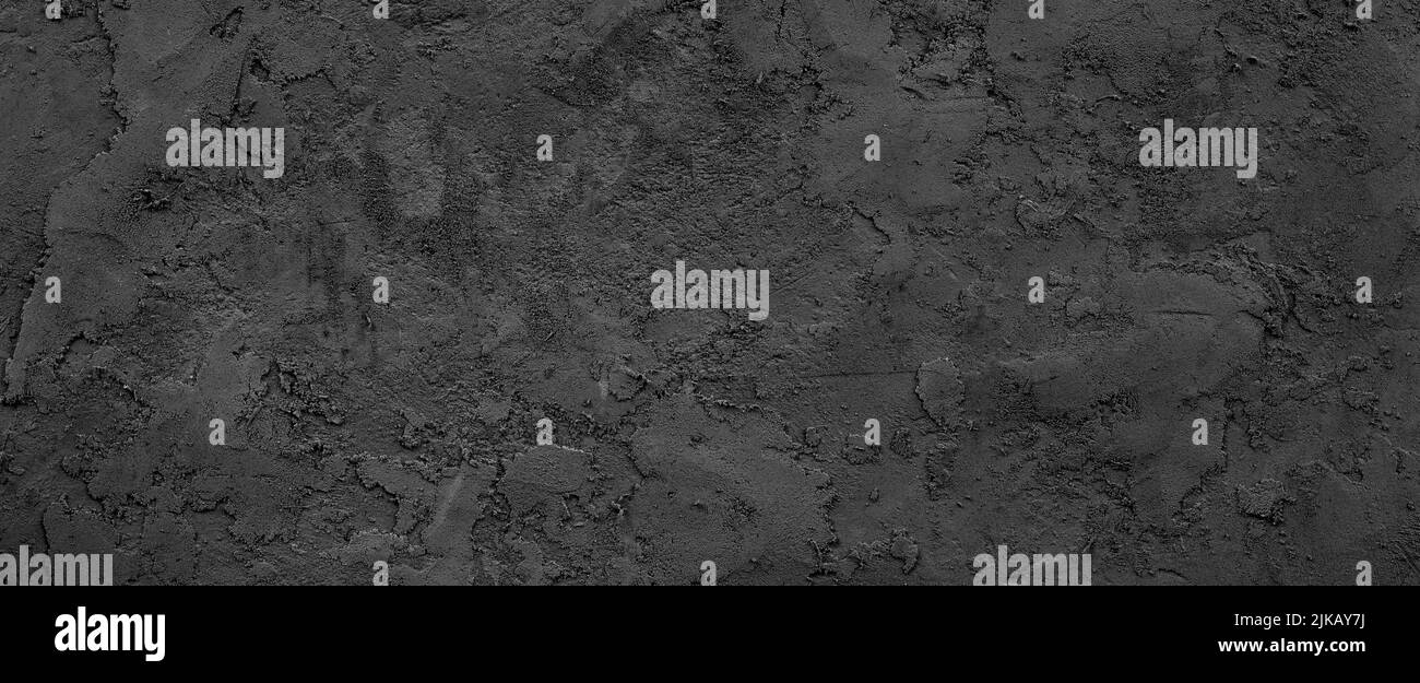 Black or dark gray rough grainy stone texture background Stock Photo