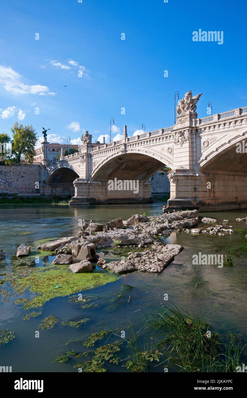Vittorio Emanuele II bridge and the remains of the ancient Neronian bridge that emerge during the Tiber river drought, Rome, Italy Stock Photo