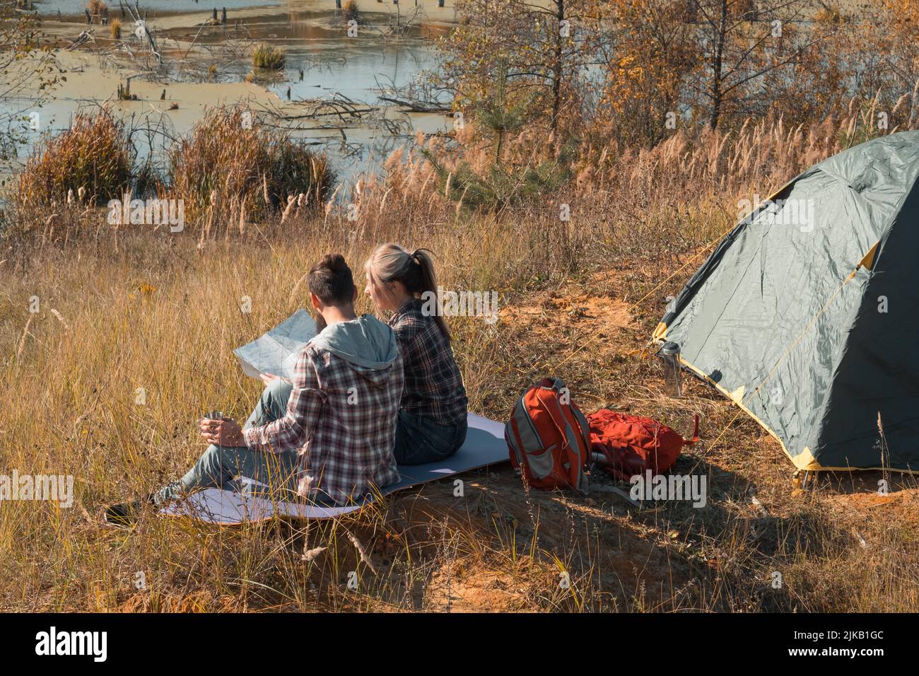 travelers lifestyle couple camping fall nature Stock Photo