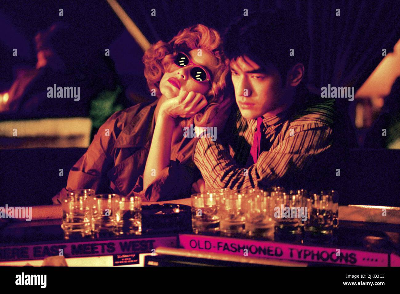 BRIGITTE LIN and TAKESHI KANESHIRO in CHUNGKING EXPRESS (1994