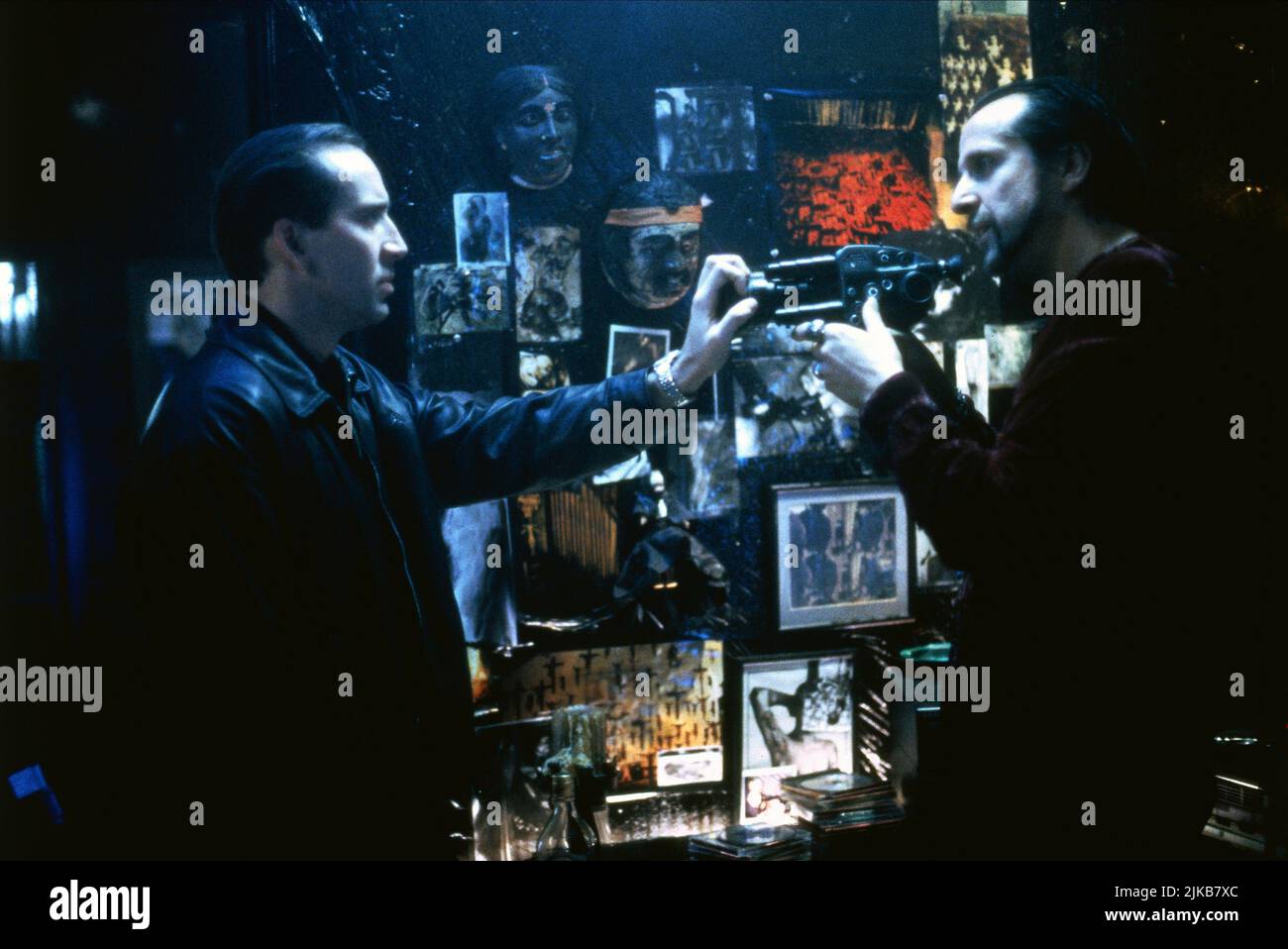 Nicolas Cage & Peter Stormare Film: 8mm (USA/DE 1999) Characters: Tom Welles & Dino Velvet  Director: Joel Schumacher 19 February 1999   **WARNING** This Photograph is for editorial use only and is the copyright of COLUMBIA PICTURES and/or the Photographer assigned by the Film or Production Company and can only be reproduced by publications in conjunction with the promotion of the above Film. A Mandatory Credit To COLUMBIA PICTURES is required. The Photographer should also be credited when known. No commercial use can be granted without written authority from the Film Company. Stock Photo