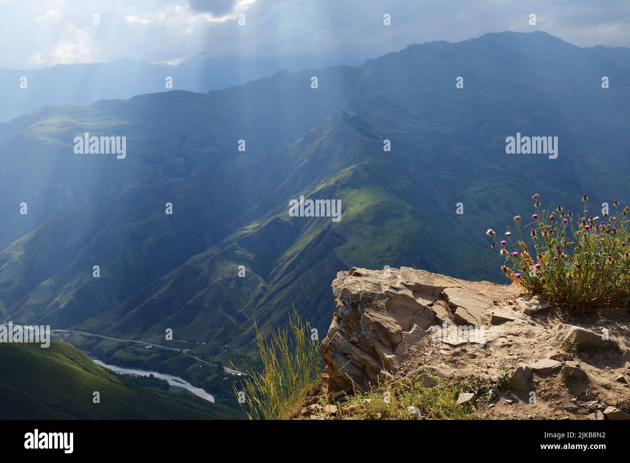 Panoramic view of the mountain valley. Dagestan scenery. Ledges of rocks near the village of Goor in Dagestan, Russia. Landscape with a cliffs and sun Stock Photo