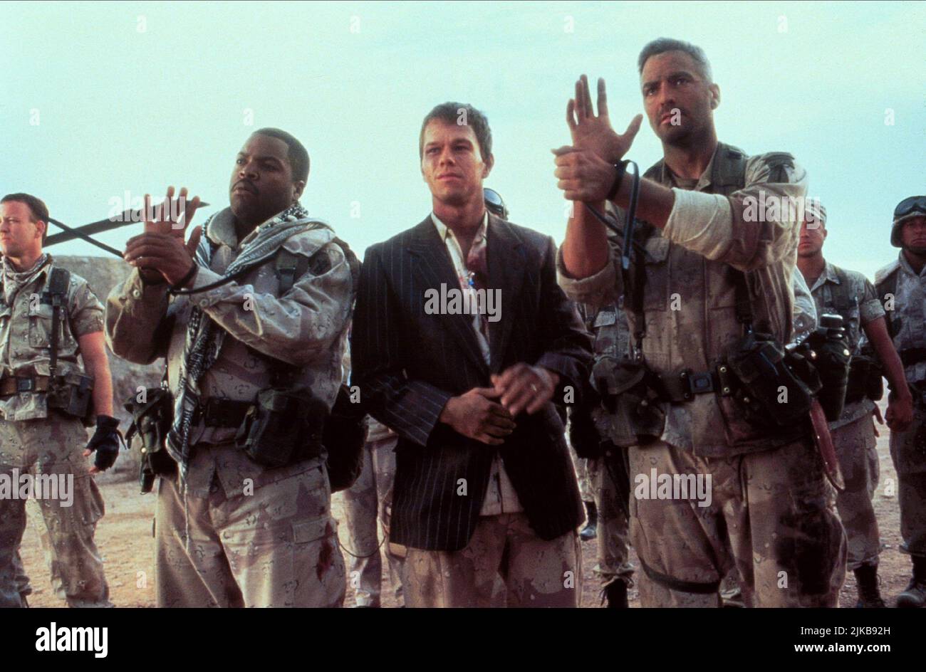 Ice Cube, Mark Wahlberg & George Clooney Film: Three Kings (USA/AUS 1999) Characters: Chief Elgin,Troy Barlow & Archie Gates  Director: David O. Russell 27 September 1999   **WARNING** This Photograph is for editorial use only and is the copyright of WARNER BROS. and/or the Photographer assigned by the Film or Production Company and can only be reproduced by publications in conjunction with the promotion of the above Film. A Mandatory Credit To WARNER BROS. is required. The Photographer should also be credited when known. No commercial use can be granted without written authority from the Film Stock Photo