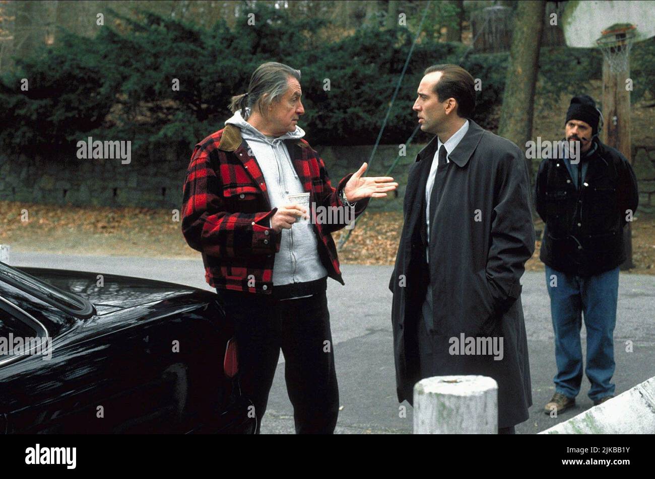 Joel Schumacher & Nicolas Cage Film: 8mm (USA/DE 1999) Characters: & Tom Welles  Director: Joel Schumacher 19 February 1999   **WARNING** This Photograph is for editorial use only and is the copyright of COLUMBIA PICTURES and/or the Photographer assigned by the Film or Production Company and can only be reproduced by publications in conjunction with the promotion of the above Film. A Mandatory Credit To COLUMBIA PICTURES is required. The Photographer should also be credited when known. No commercial use can be granted without written authority from the Film Company. Stock Photo