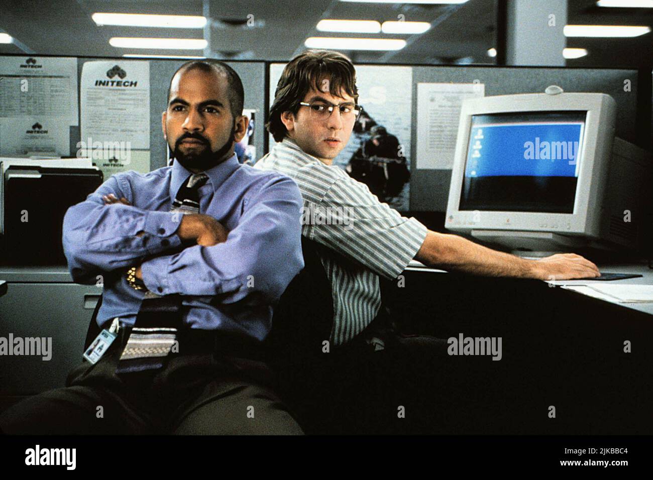 Ajay Naidu & David Herman Film: Office Space (1999) Characters: Samir Nagheenanajar & Michael Bolton  Director: Mike Judge 19 February 1999   **WARNING** This Photograph is for editorial use only and is the copyright of 20 CENTURY FOX and/or the Photographer assigned by the Film or Production Company and can only be reproduced by publications in conjunction with the promotion of the above Film. A Mandatory Credit To 20 CENTURY FOX is required. The Photographer should also be credited when known. No commercial use can be granted without written authority from the Film Company. Stock Photo