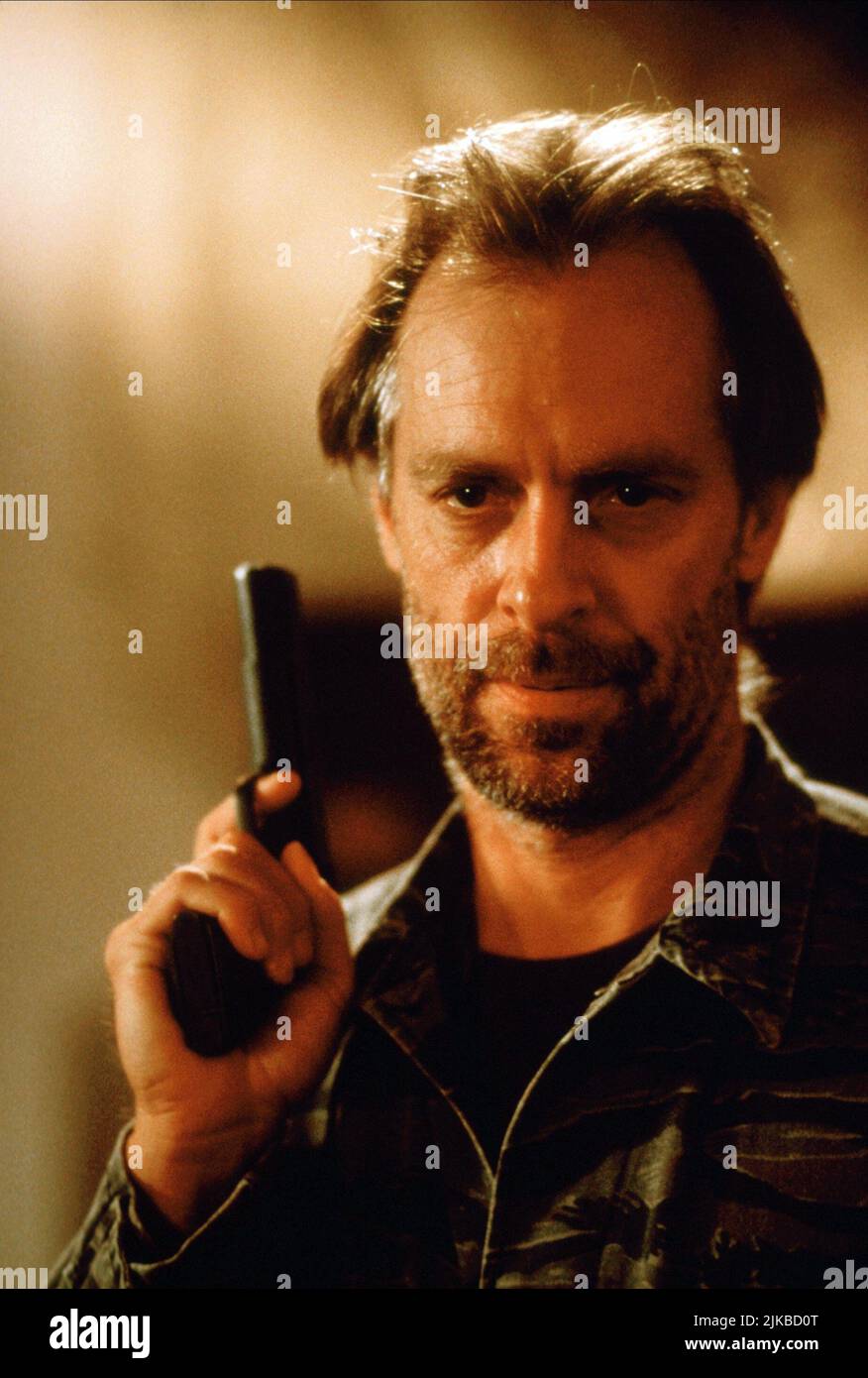 Keith Carradine Television: Hard Time: Hostage Hotel (TV-Film) Characters: Cpl. Arlin Flynn  Usa 1999, Director: Hal Needham 14 November 1999   **WARNING** This Photograph is for editorial use only and is the copyright of TNT and/or the Photographer assigned by the Film or Production Company and can only be reproduced by publications in conjunction with the promotion of the above Film. A Mandatory Credit To TNT is required. The Photographer should also be credited when known. No commercial use can be granted without written authority from the Film Company. Stock Photo
