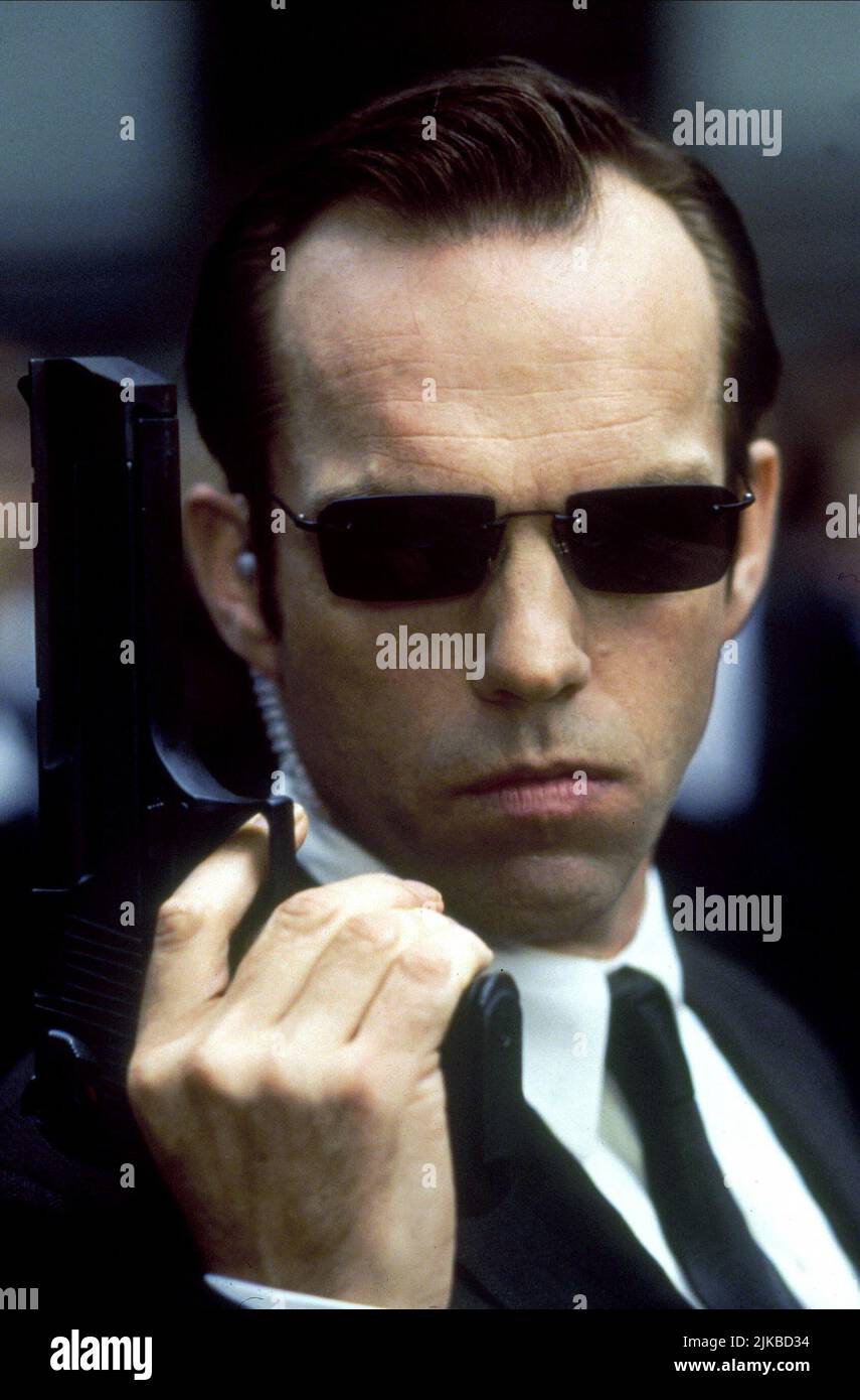 Hugo Weaving Film: The Matrix (USA/AUS 1999) Characters: Agent Smith  Director: The Wachowski Brothers 31 March 1999   **WARNING** This Photograph is for editorial use only and is the copyright of WARNER BROS. and/or the Photographer assigned by the Film or Production Company and can only be reproduced by publications in conjunction with the promotion of the above Film. A Mandatory Credit To WARNER BROS. is required. The Photographer should also be credited when known. No commercial use can be granted without written authority from the Film Company. Stock Photo