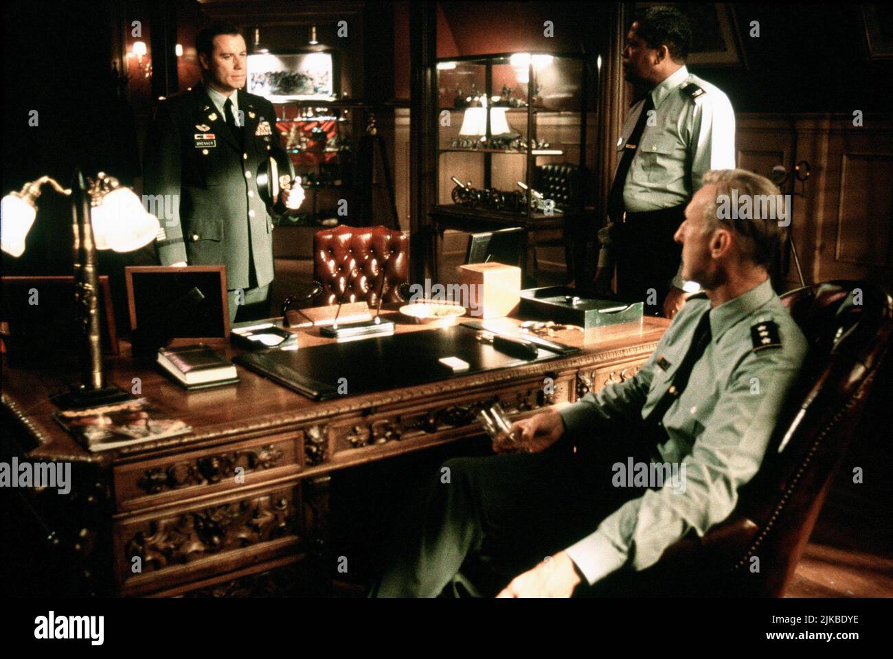 John Travolta, Clarence Williams Iii & James Cromwell, Film: The General'S Daughter (1999) Characters: Warr. Off. Paul Brenner,Col. George Fowler & Lt. Gen. Joseph Campbell,  Director: Simon West 18 June 1999   **WARNING** This Photograph is for editorial use only and is the copyright of PARAMOUNT PICTURES and/or the Photographer assigned by the Film or Production Company and can only be reproduced by publications in conjunction with the promotion of the above Film. A Mandatory Credit To PARAMOUNT PICTURES is required. The Photographer should also be credited when known. No commercial use can Stock Photo