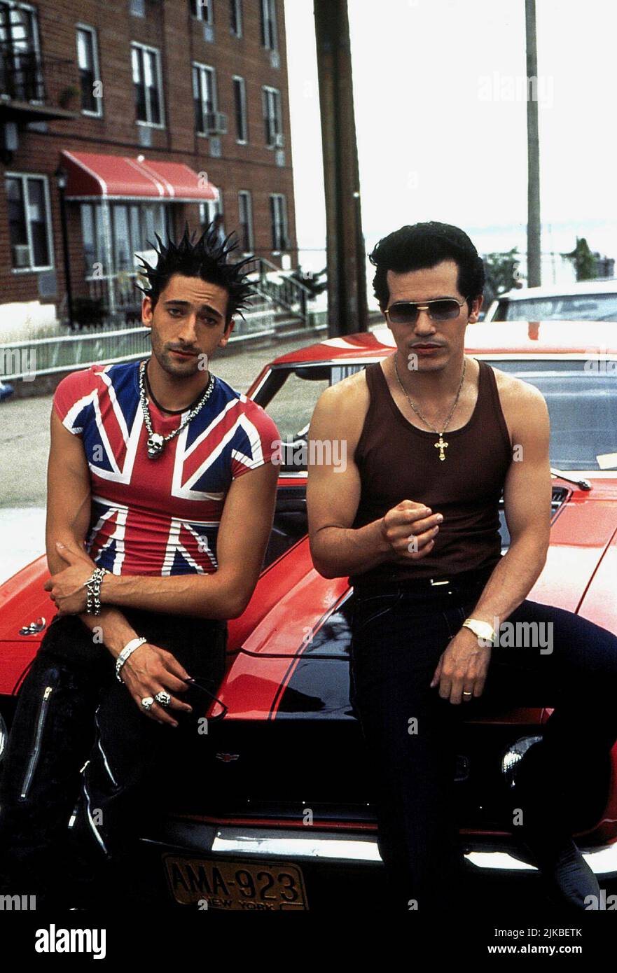 Adrien Brody & John Leguizamo Film: Summer Of Sam (USA 1999) Characters: Richie & Vinny  Director: Spike Lee 20 May 1999   **WARNING** This Photograph is for editorial use only and is the copyright of TOUCHSTONE PICTURES and/or the Photographer assigned by the Film or Production Company and can only be reproduced by publications in conjunction with the promotion of the above Film. A Mandatory Credit To TOUCHSTONE PICTURES is required. The Photographer should also be credited when known. No commercial use can be granted without written authority from the Film Company. Stock Photo