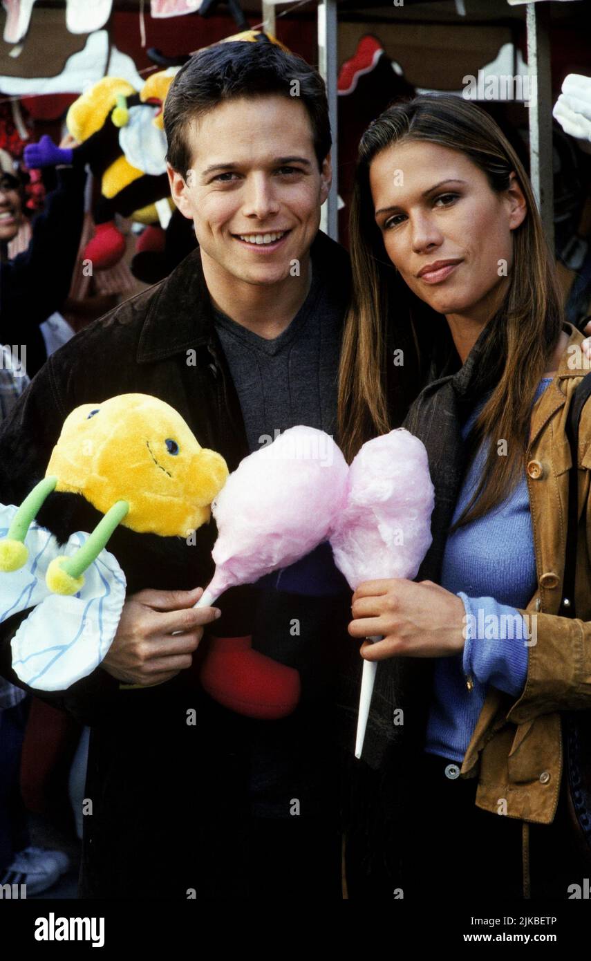 Scott Wolf & Rhona Mitra Television: Party Of Five : Season 6 (1999) Characters: Bailey Salinger & Holly Marie Beggins (12 episodes, 1999-2000) Candy Floss 05 October 1999   **WARNING** This Photograph is for editorial use only and is the copyright of FOX NETWORK and/or the Photographer assigned by the Film or Production Company and can only be reproduced by publications in conjunction with the promotion of the above Film. A Mandatory Credit To FOX NETWORK is required. The Photographer should also be credited when known. No commercial use can be granted without written authority from the Film Stock Photo