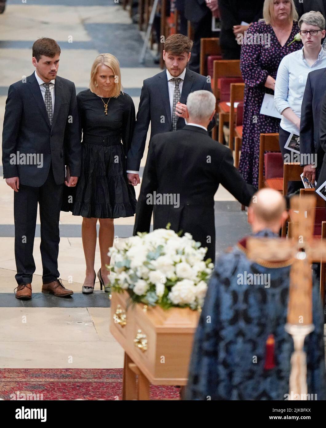 Harry Gration's widow Helen Chene with sons Harrison (left) and Harvey (right) at a service of thanksgiving for the BBC presenter at York Minster in York. Picture date: Monday August 1, 2022. Stock Photo