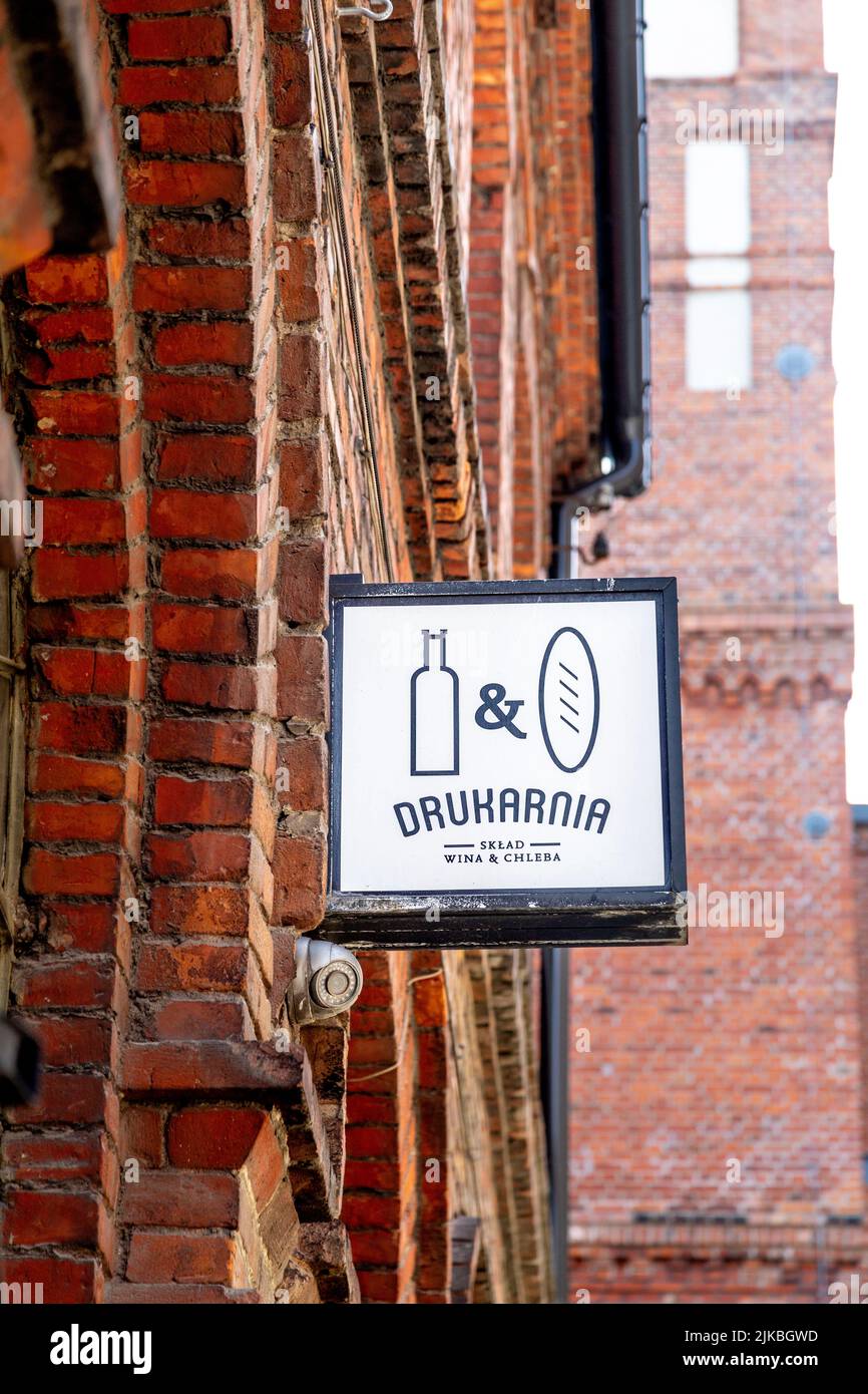 Drukarnia Sklad Wina i Chleba restaurant at former late 19th century Ramisch cotton mill converted into OFF Piotrkowska Center with restaurants and sh Stock Photo
