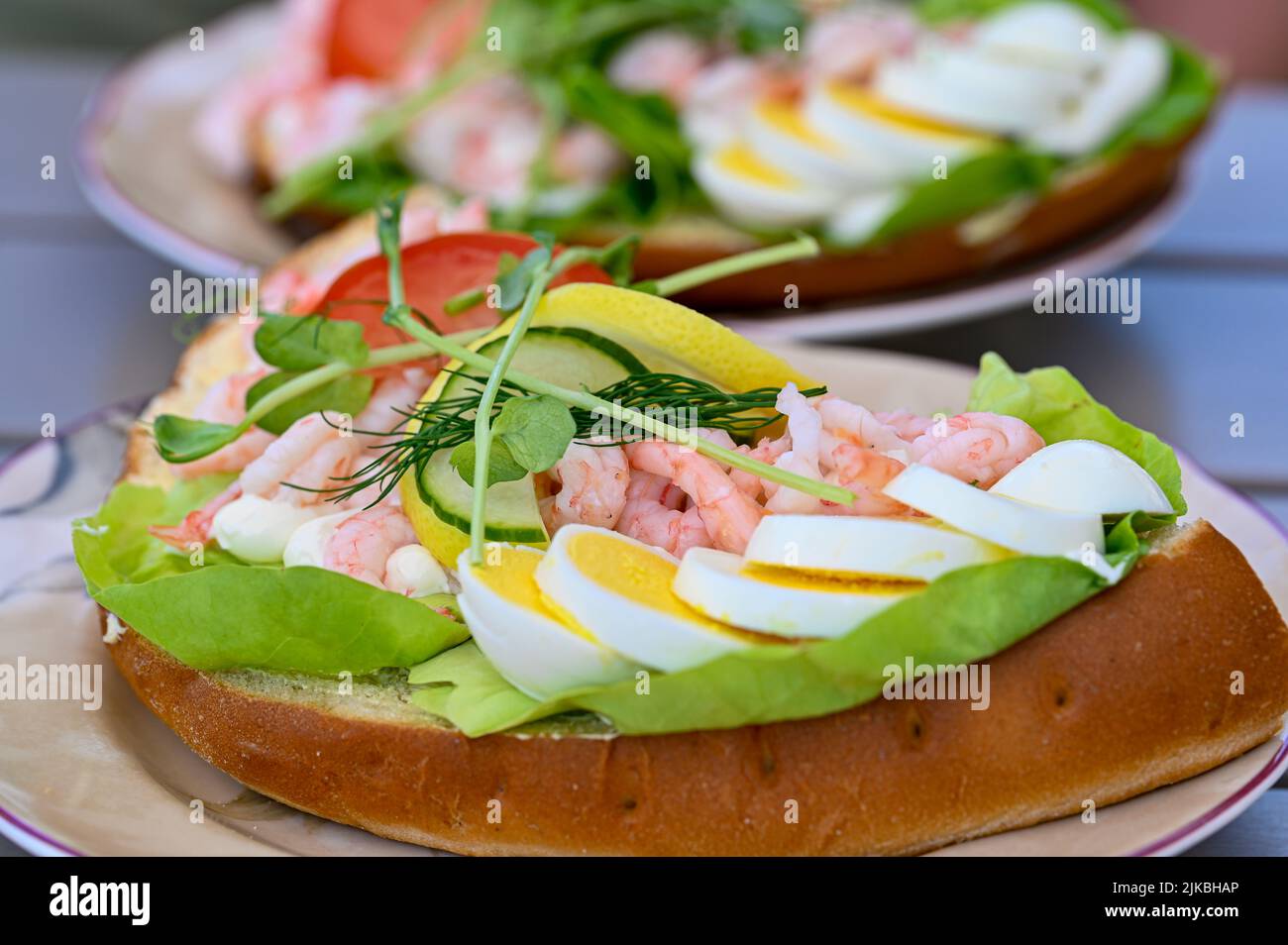 fresh shrimp sandwich with egg mayonnaise and vegetables Stock Photo