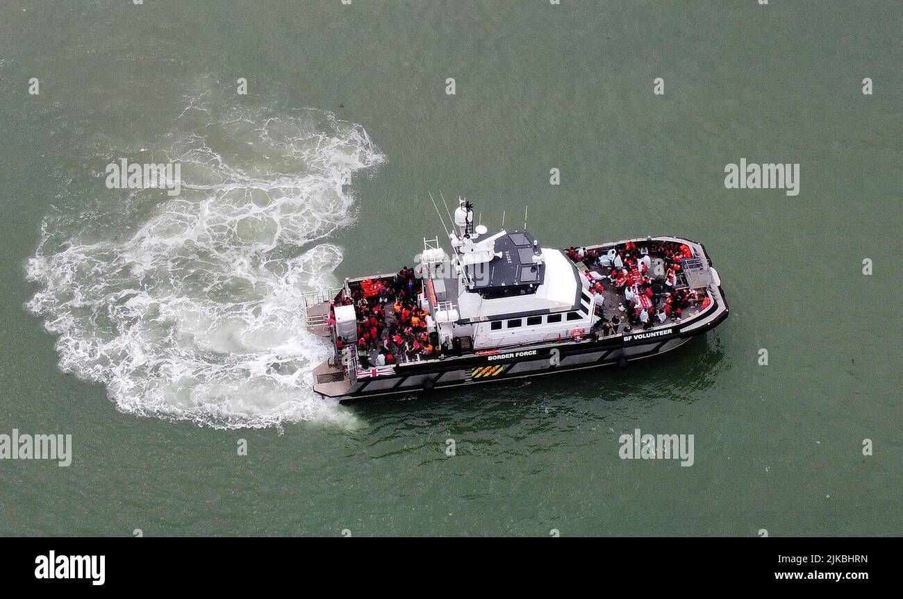 A group of people thought to be migrants are brought in to Ramsgate, Kent, onboard a Border Force vessel following a small boat incident in the Channel. Picture date: Monday August 1, 2022. Stock Photo