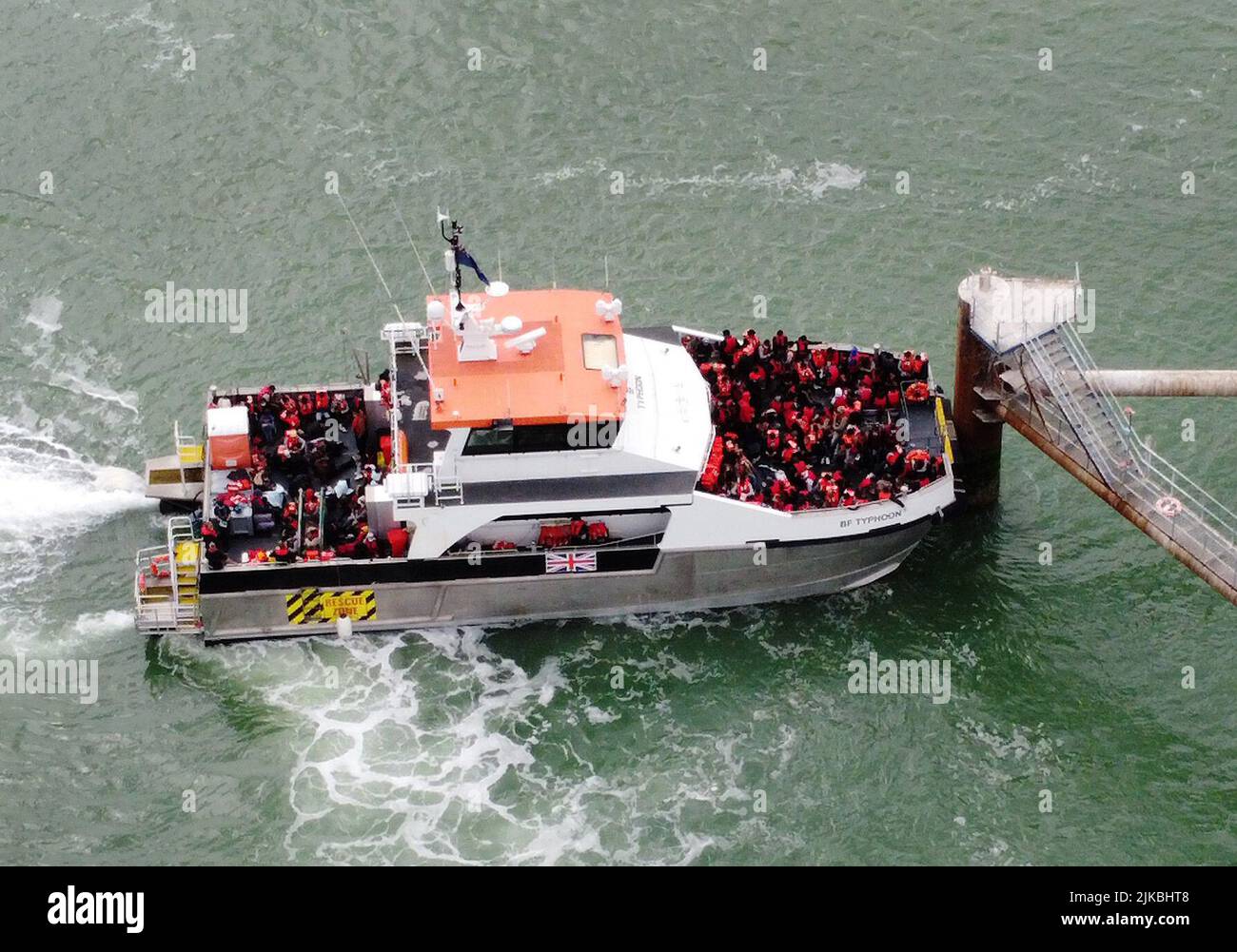 A group of people thought to be migrants are brought in to Ramsgate, Kent, onboard a Border Force vessel following a small boat incident in the Channel. Picture date: Monday August 1, 2022. Stock Photo