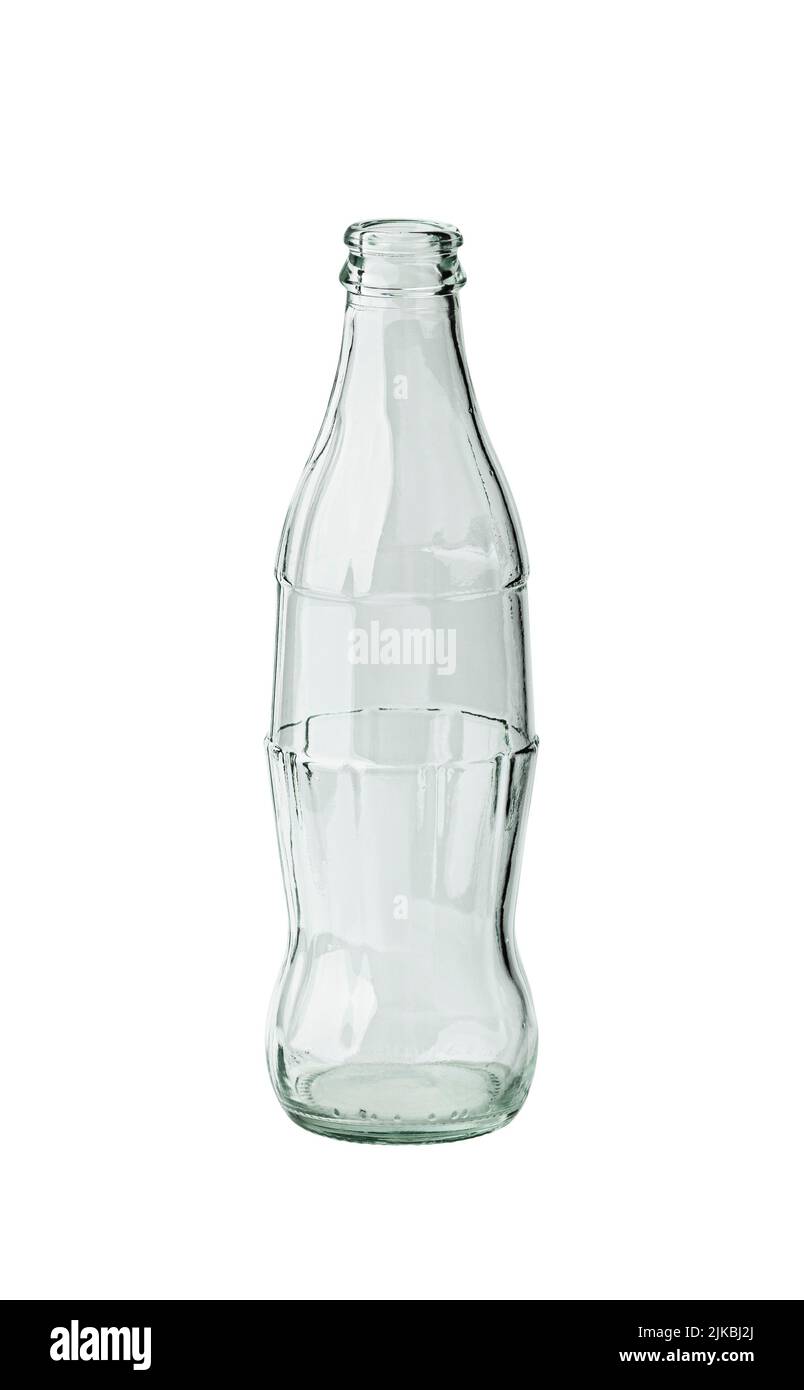 CHISINAU, MOLDOVA - July 24, 2022: Empty Coca Cola bottle. Coca Cola drinks are produced and manufactured by The Coca-Cola Company, an American multin Stock Photo