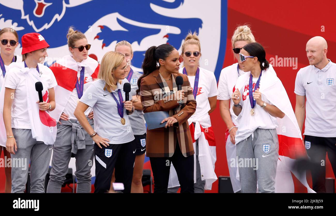 England head coach Sarina Wiegman and Lucy Bronze speak to presenter Alex Scott on stage during a fan celebration to commemorate England's historic UEFA Women's EURO 2022 triumph in Trafalgar Square, London. Picture date: Monday August 1, 2022. Stock Photo