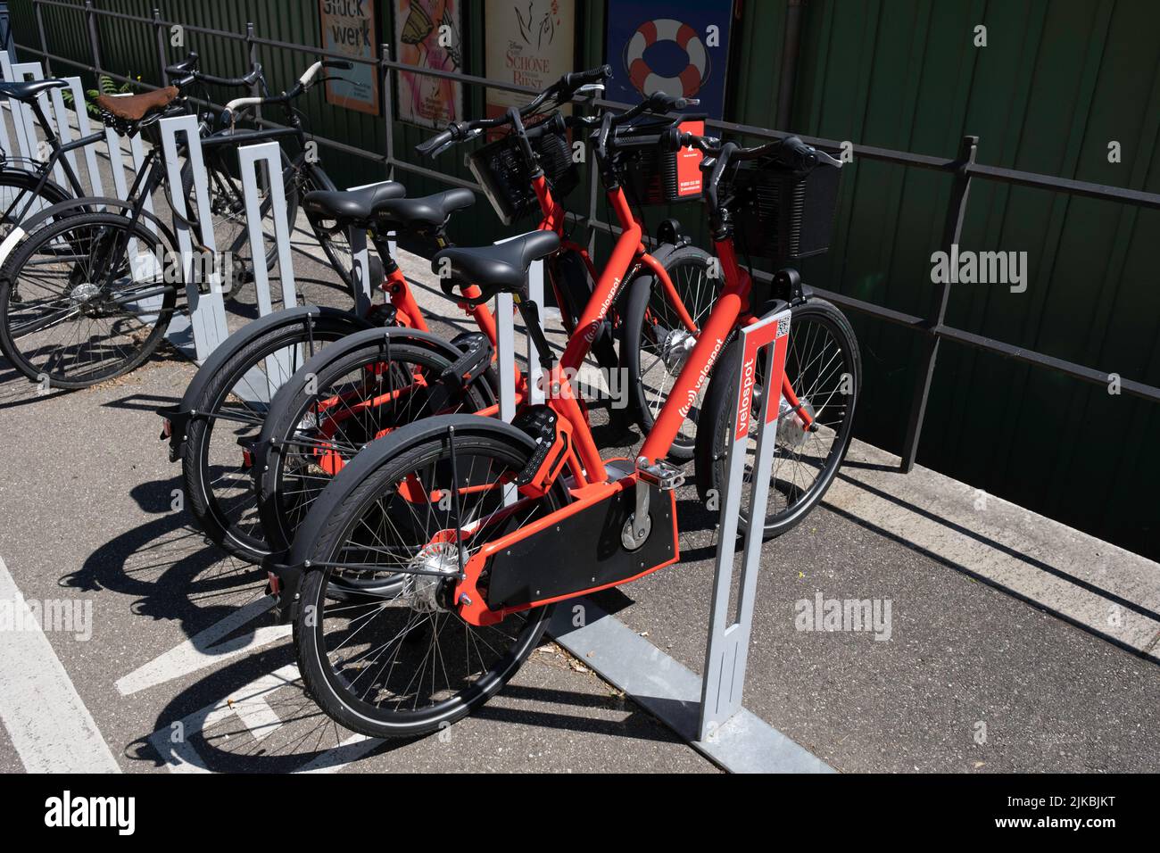 Parked bicycles from Velospot in Basel, Switzerland. Basel's new bike