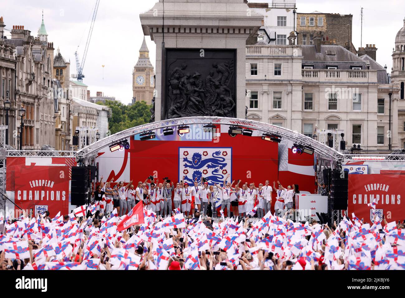 England players sing Sweet Caroline on stage during a fan celebration