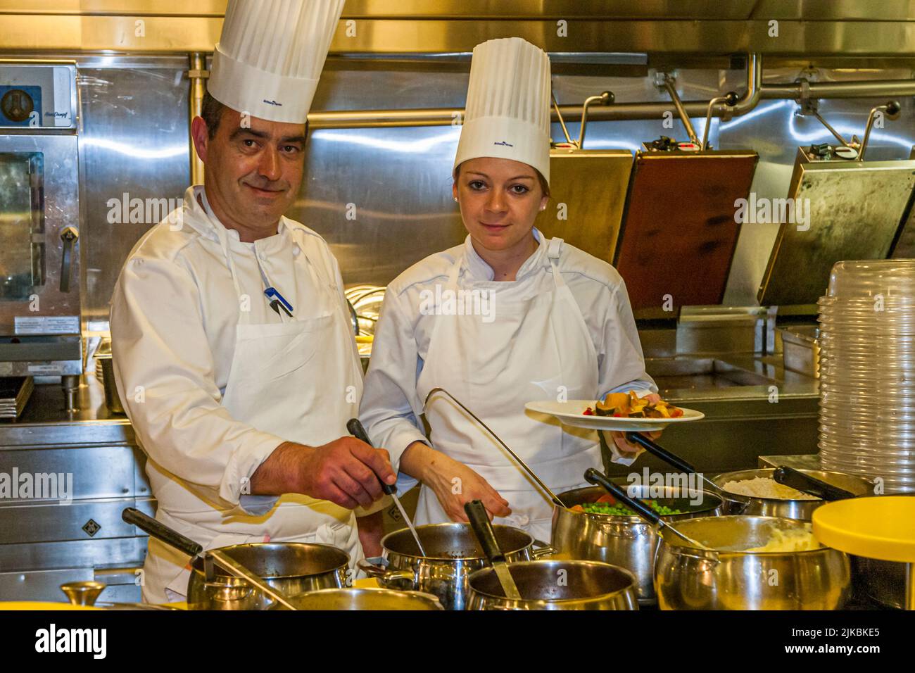 French cuisine on the Armorique: at the buffet you are served by the chefs themselves Stock Photo