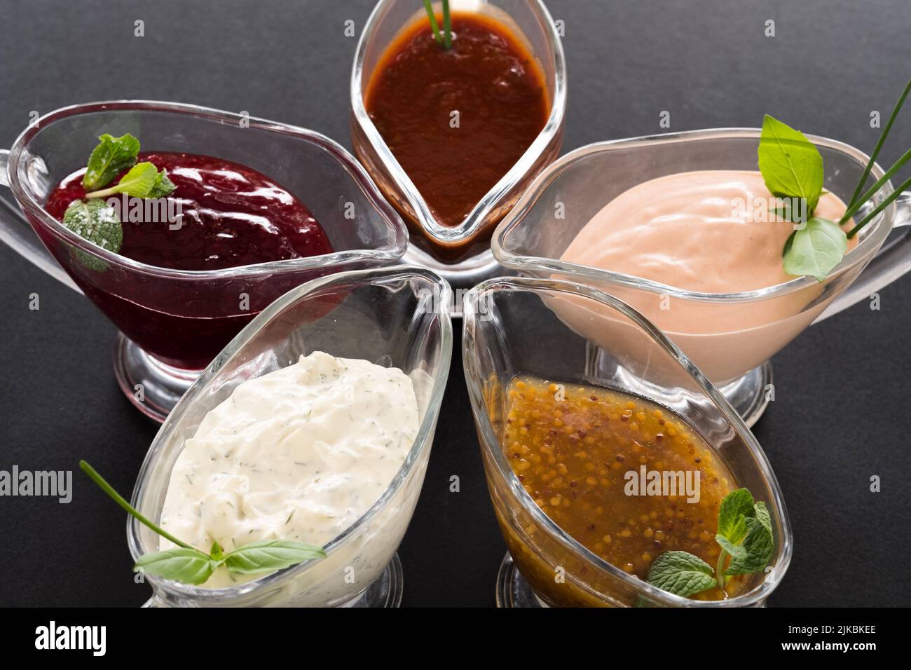 restaurant sauce glass gravy boat background Stock Photo Alamy