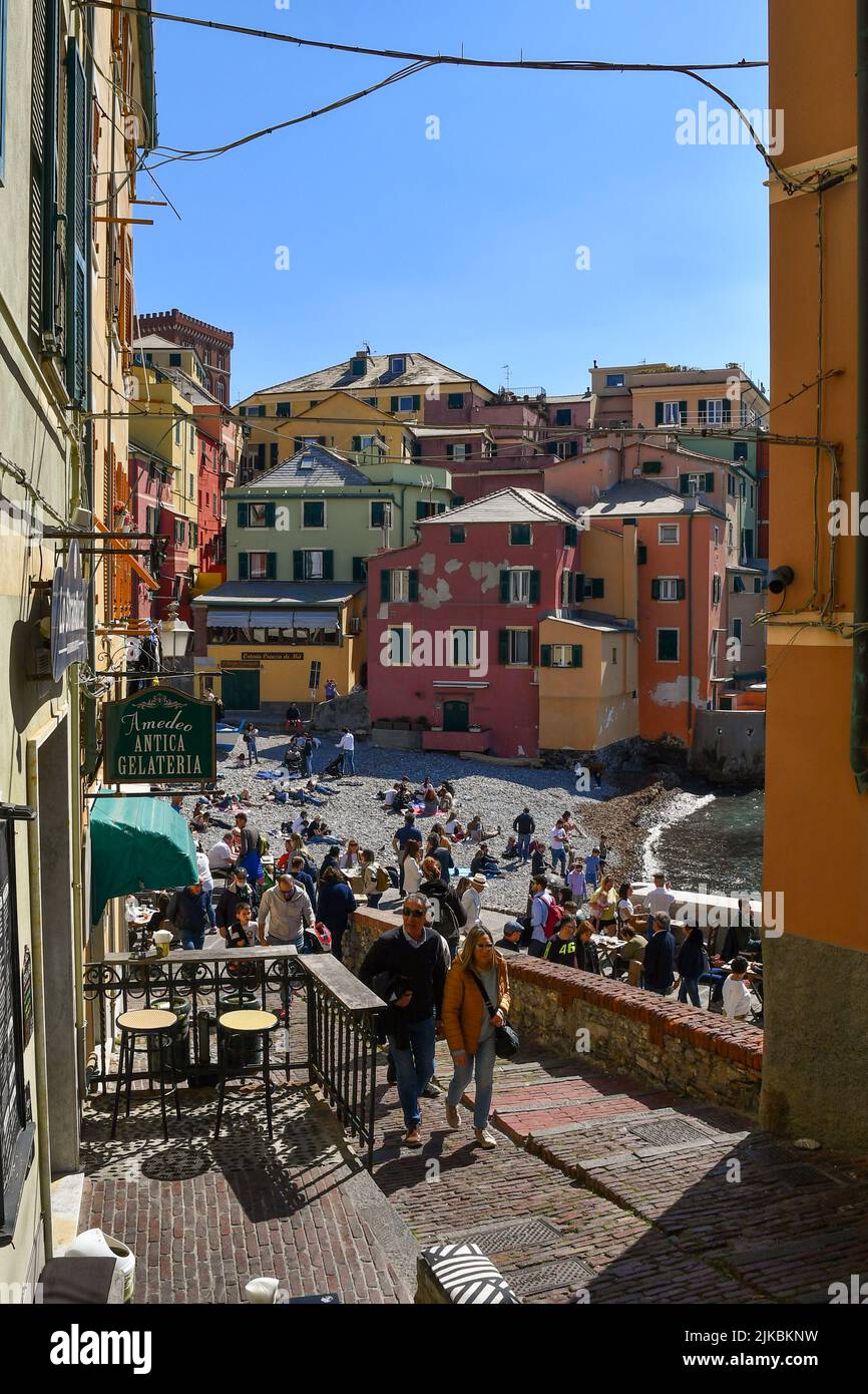 View of the fishing village of the Italian Riviera with the small beach and tourists on Easter Monday, Boccadasse, Genoa, Liguria, Italy Stock Photo