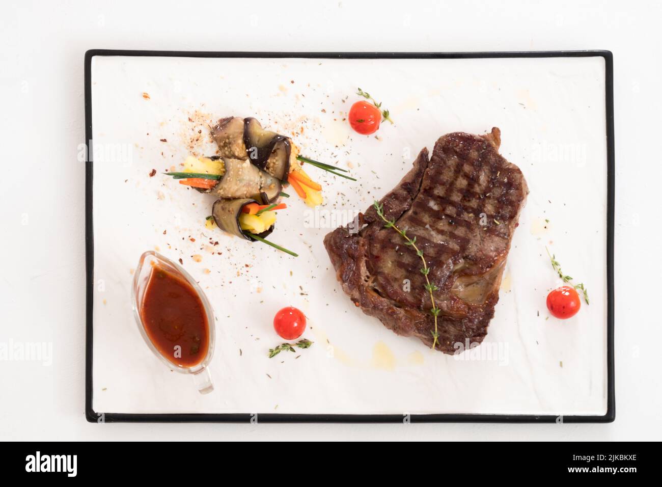 cooking art roasted meat vegetable course platter Stock Photo Alamy