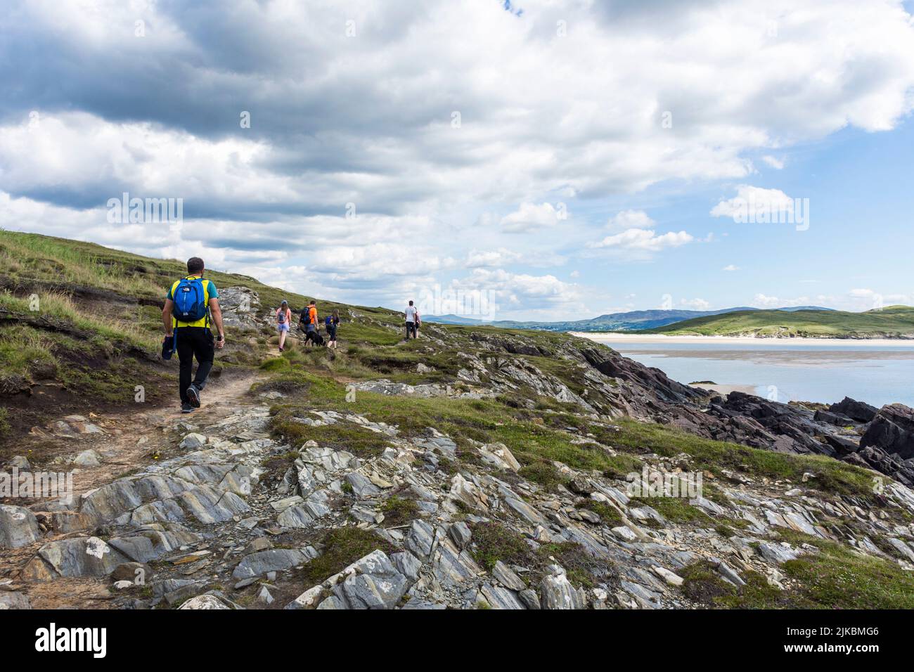 Walkers on  Sheskinmore Nature Reserve. Sheskinmore refers to a large area of sand dunes, lake and marsh that lies between Kiltooris and Ballinreavy S Stock Photo