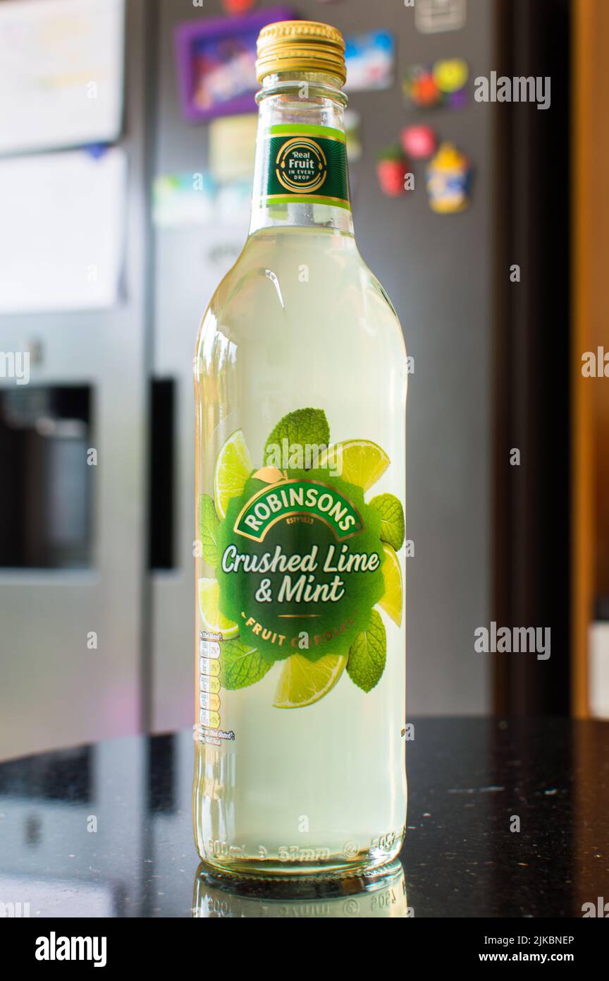 Robinsons Crushed Lime and Mint Cordial concentrated drink in a bottle on a kitchen top Stock Photo