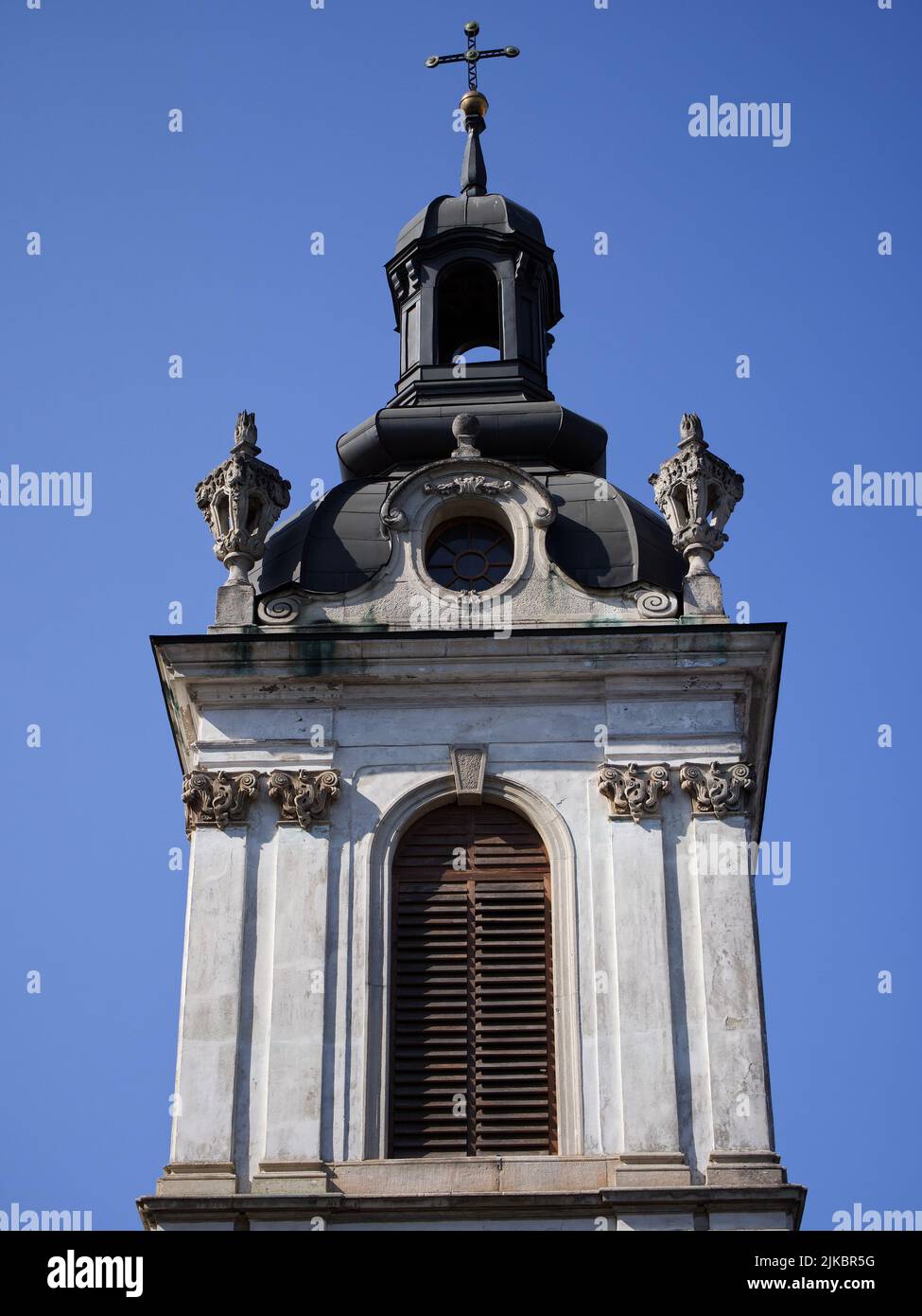 A small beautiful tower on the Cathedral of St. George in Lviv, Ukraine. Baroque architecture. Clear blue sky. Stock Photo