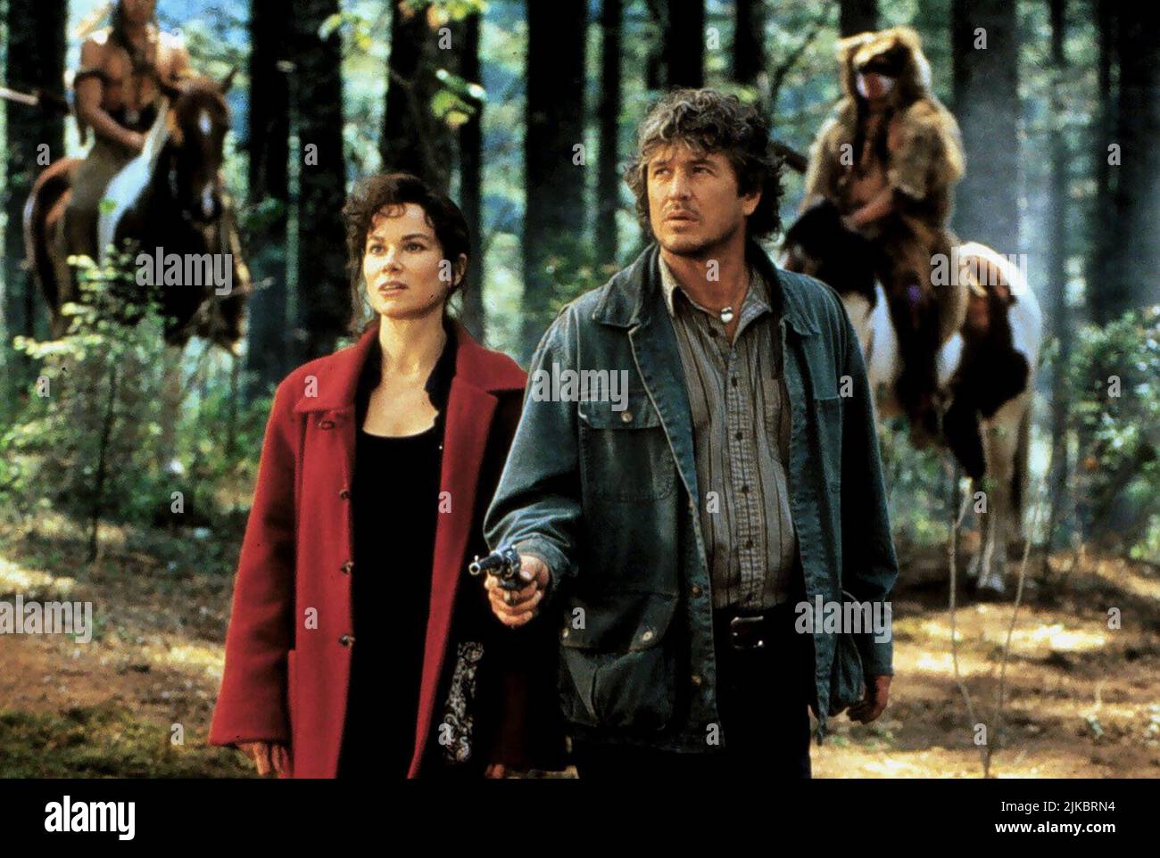 Barbara Hershey & Tom Berenger Film: Last Of The Dogmen (1995) Characters: Prof. Lillian Diane Sloan & Lewis Gates  Director: Tab Murphy 08 September 1995   **WARNING** This Photograph is for editorial use only and is the copyright of SAVOY PICTURES and/or the Photographer assigned by the Film or Production Company and can only be reproduced by publications in conjunction with the promotion of the above Film. A Mandatory Credit To SAVOY PICTURES is required. The Photographer should also be credited when known. No commercial use can be granted without written authority from the Film Company. Stock Photo