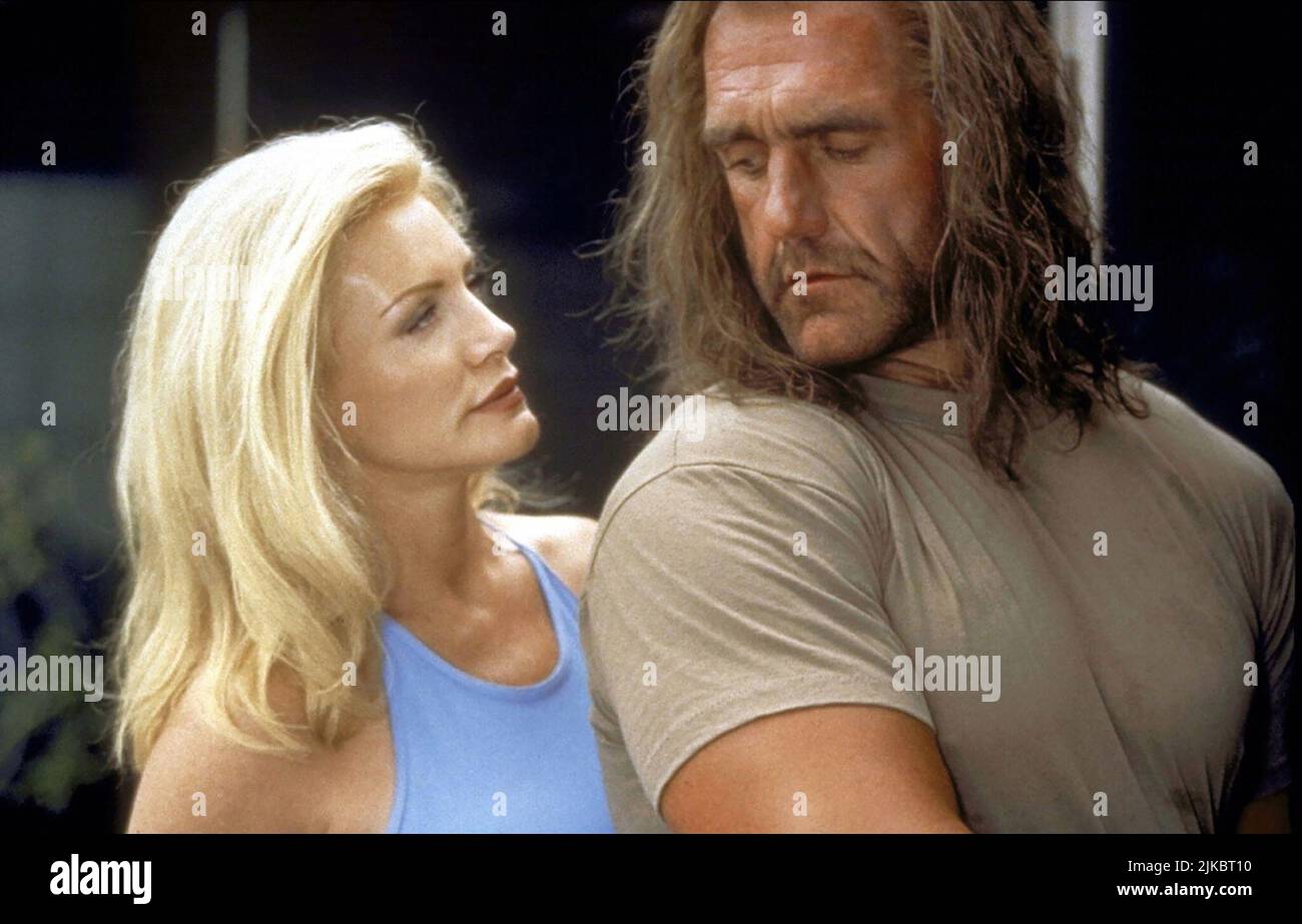 Shannon Tweed & Hulk Hogan Film: Shadow Warriors Ii; Hunt For The Death Merchant (1999) Characters: Hunter Wiley, Mike McBride  Director: Jon Cassar 04 May 1999   **WARNING** This Photograph is for editorial use only and is the copyright of CRESCENT ENTERTAINMENT and/or the Photographer assigned by the Film or Production Company and can only be reproduced by publications in conjunction with the promotion of the above Film. A Mandatory Credit To CRESCENT ENTERTAINMENT is required. The Photographer should also be credited when known. No commercial use can be granted without written authority fro Stock Photo
