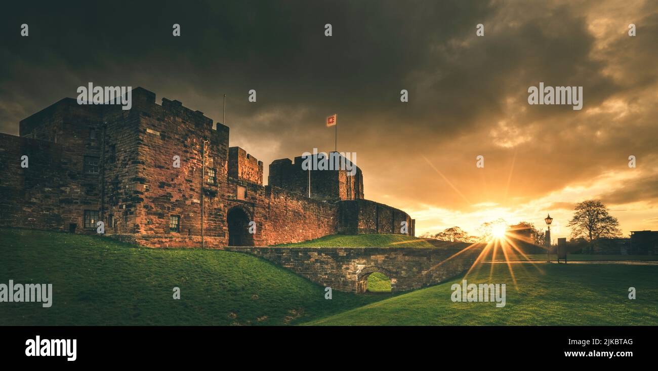 Carlisle Castle including De Ireby's Tower and The Keep pictured at sunrise in the City of Carlisle. Stock Photo