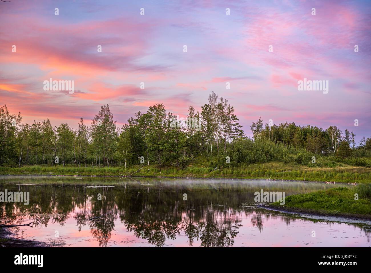 Pretty sunset over a wetland in northern Wisconsin. Stock Photo