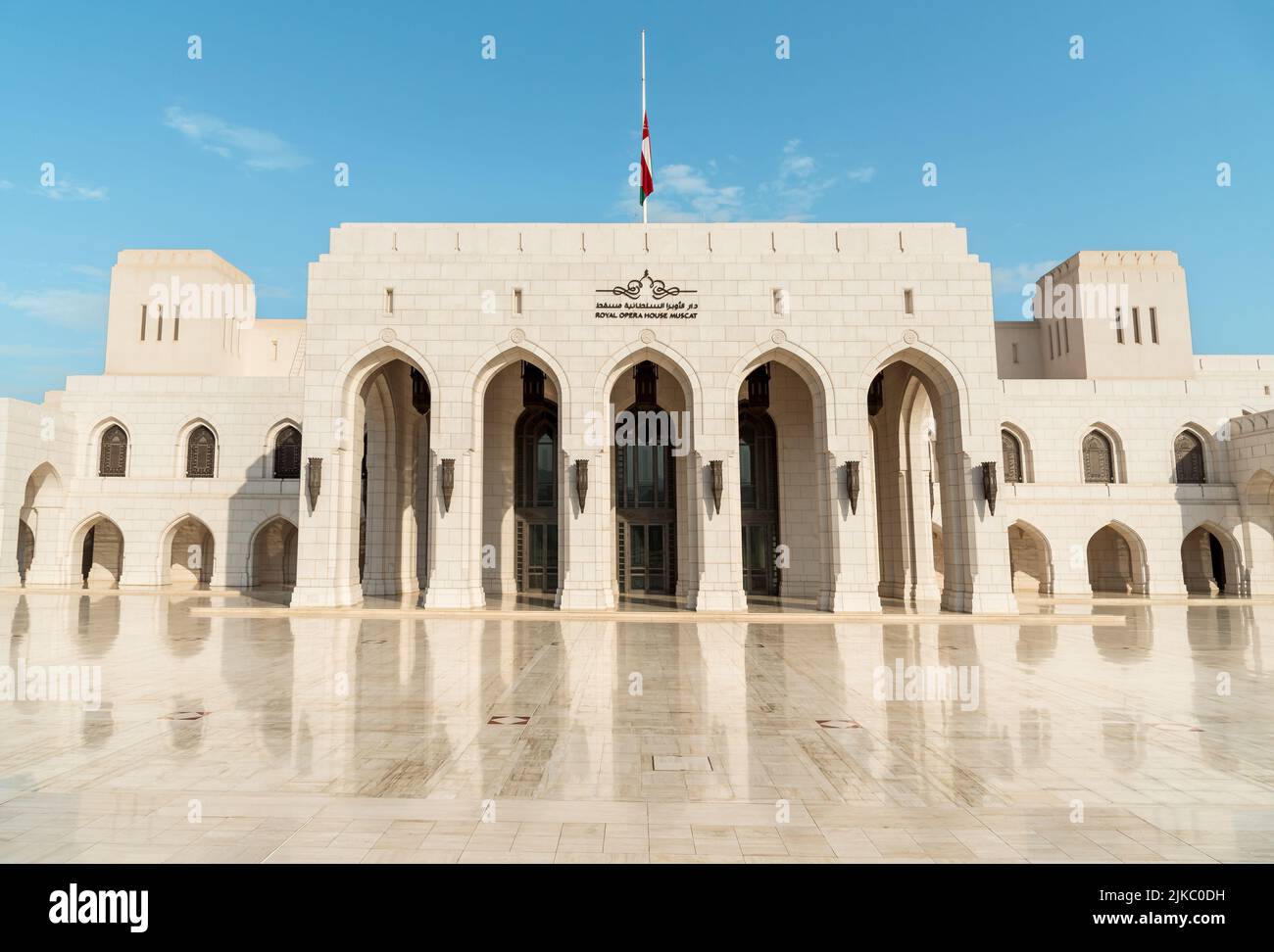 Facade of the Royal Opera House in Muscat with national flag of Oman in Muscat, Sultanate of Oman Stock Photo