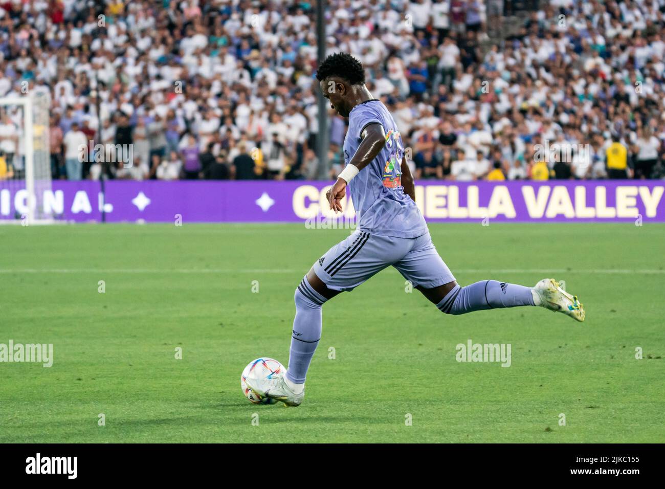 Real Madrid forward Vinícius Júnior (20) looks to send a pass during a Soccer Champions Tour match against Juventus, Saturday, July 30, 2022, at the R Stock Photo