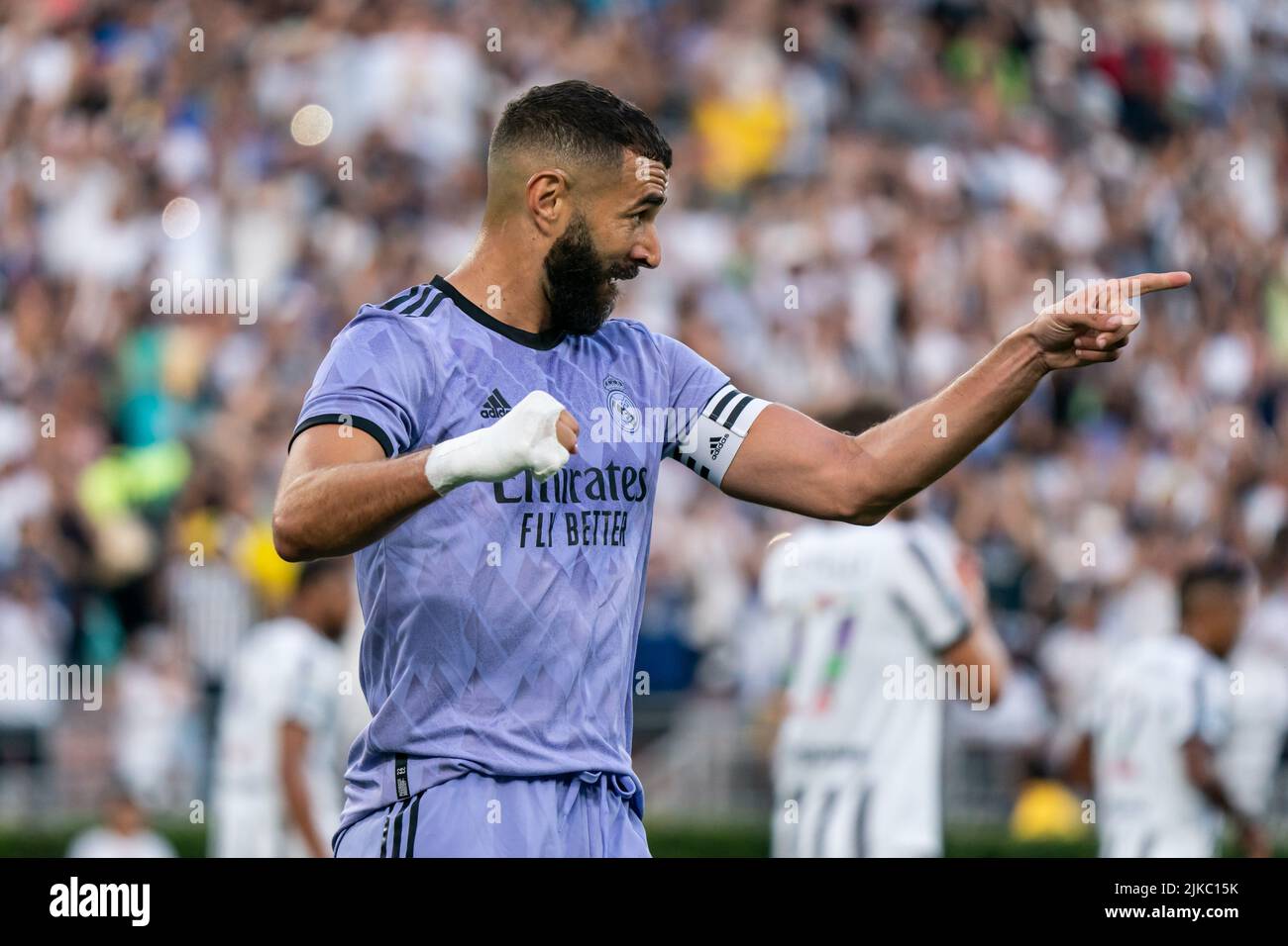Real Madrid forward Karim Benzema (9) celebrates after scoring a ...