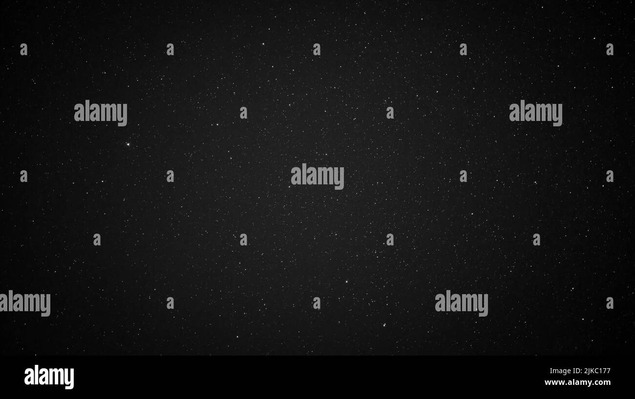 A Grayscale Of A Sky Full Of Stars Stock Photo Alamy