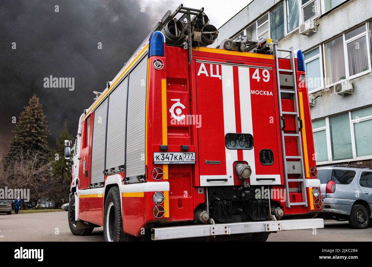 Moscow Fire Engine December 13, 2019, Moscow, Russia. A fire service vehicle at the scene ...