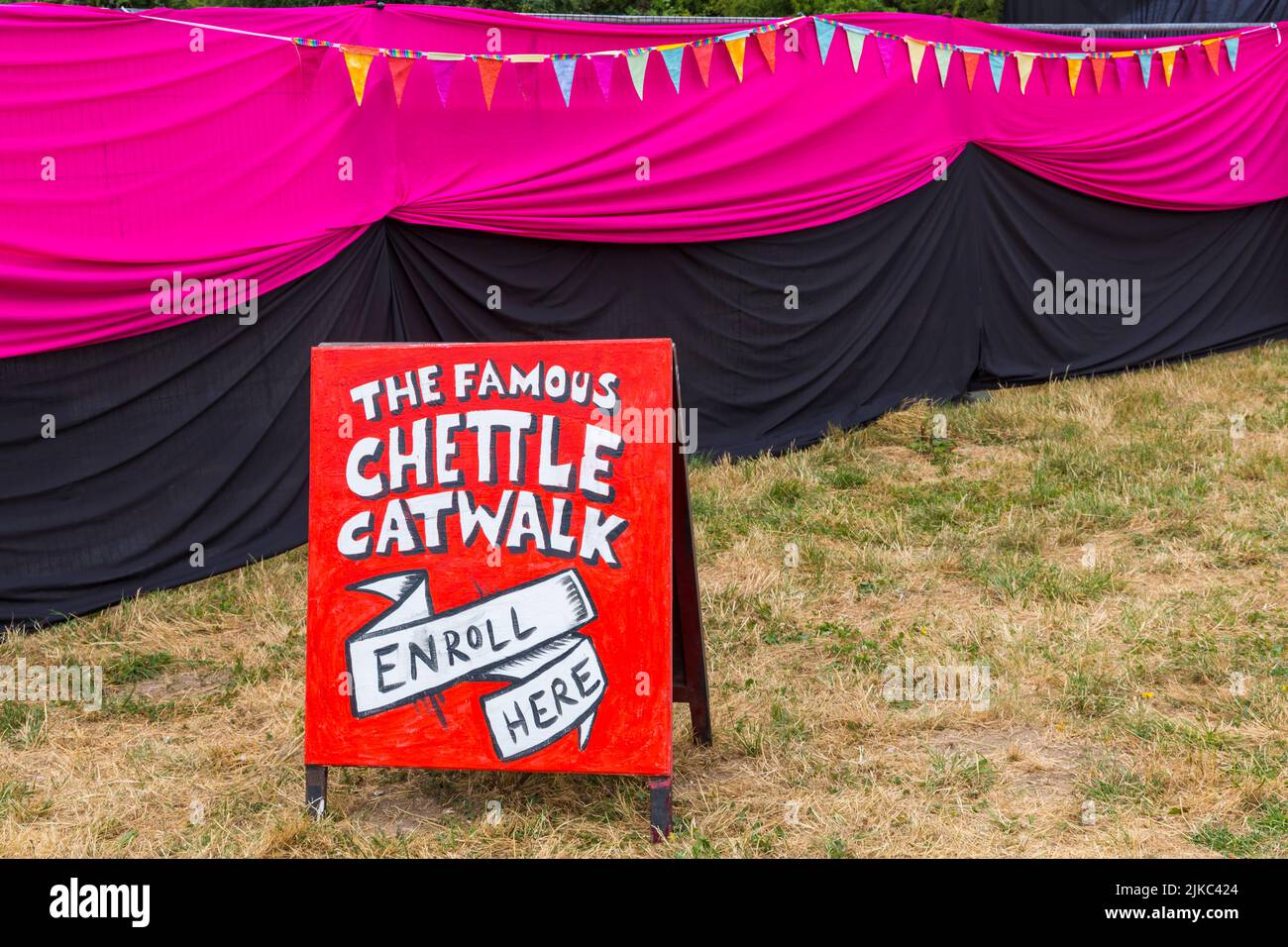The Famous Chettle Catwalk enroll here sign at Chettle Village fete, Chettle, Dorset UK in July Stock Photo