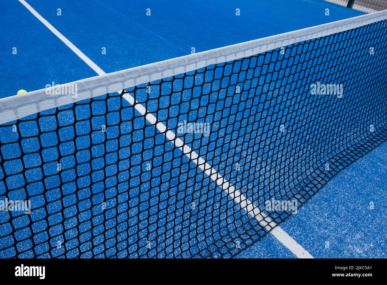 racket sports concept, blue paddle tennis court netting Stock Photo Alamy