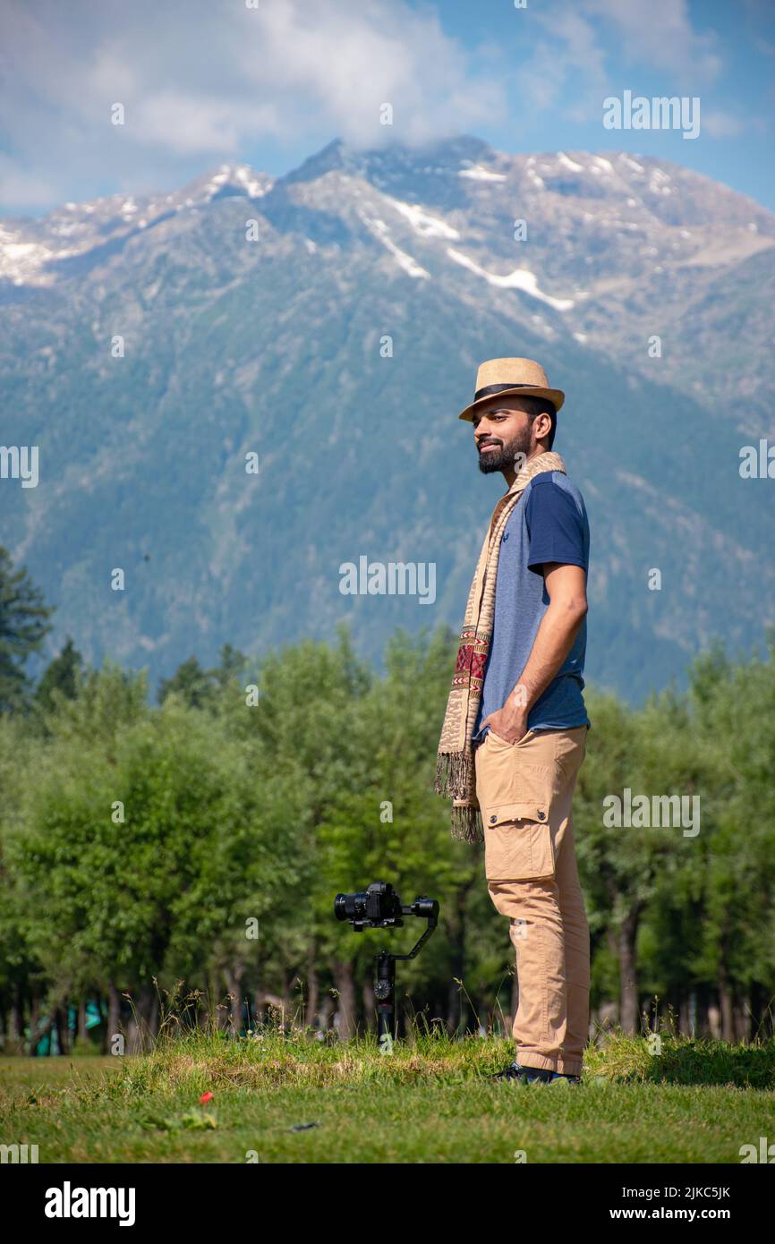 Hiker in the mountains, Betaab Valley, Pahalgam, Jammu and Kashmir, India. Stock Photo